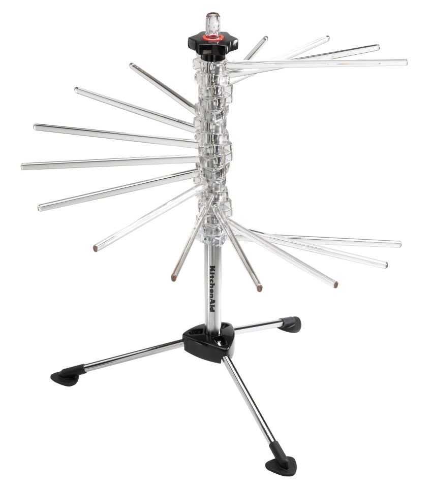 Home chef using KitchenAid KPDR pasta accessories in the kitchen.