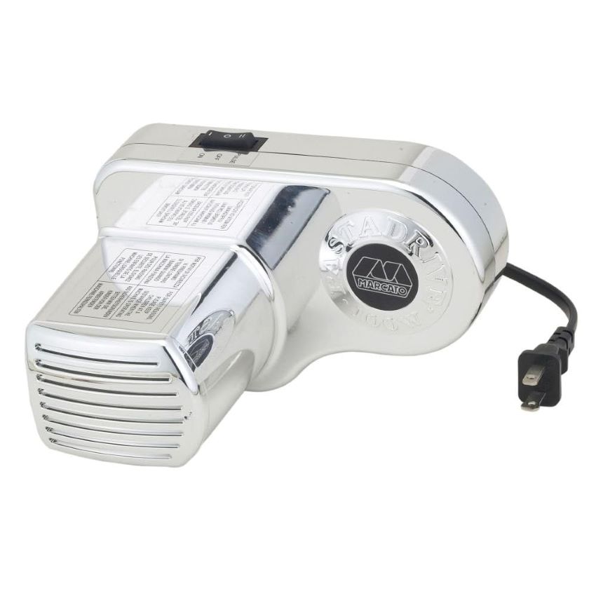 Fresh pasta being extruded using the Marcato Atlasmotor electric pasta machine at home.